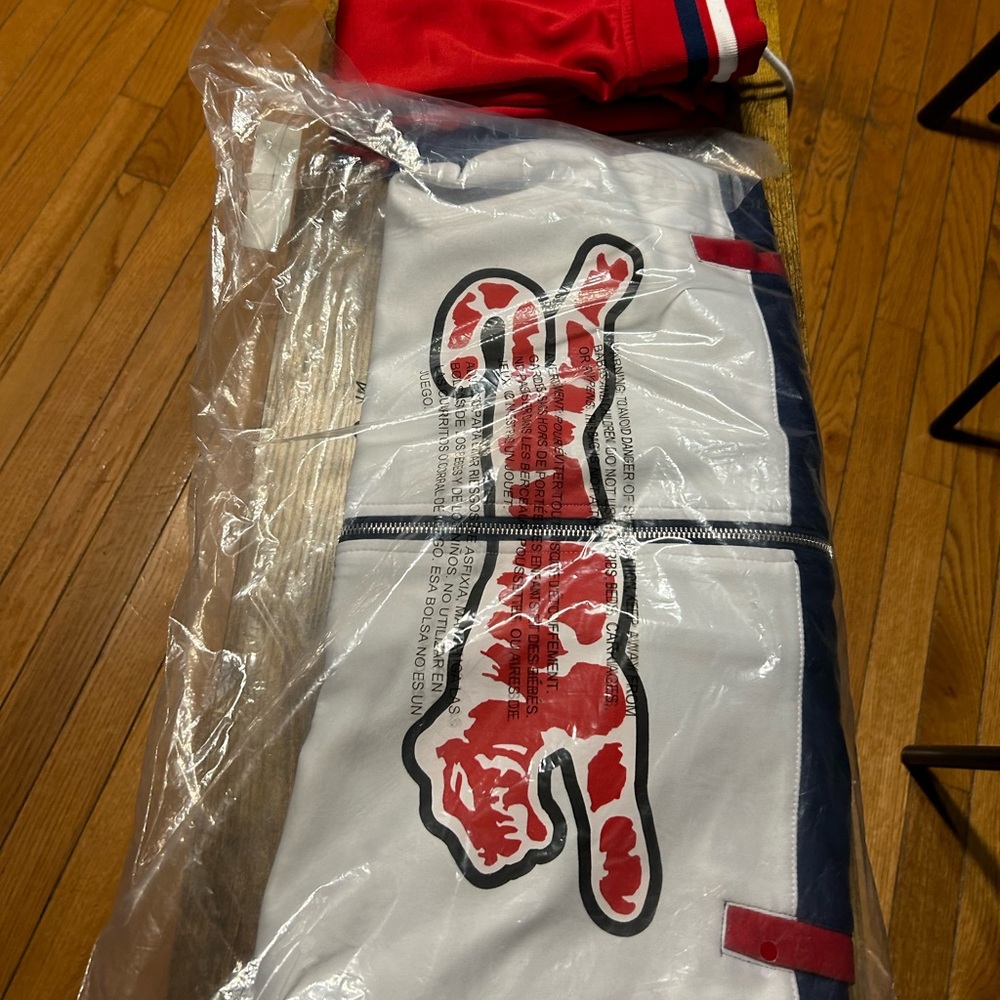 red/white/blue le tiger sweat suit, pants (opened never worn) and new jacket